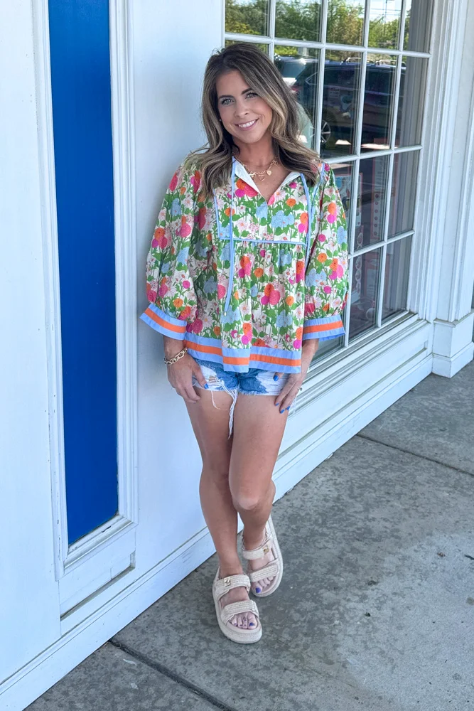 summer tops outfit 2026 Flowy Floral Tunics with Relaxed Weekend Style