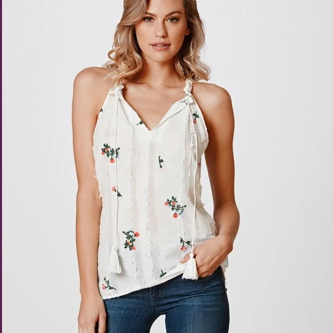 summer tops outfit 2026 Flowy White Tops with Delicate Floral Details