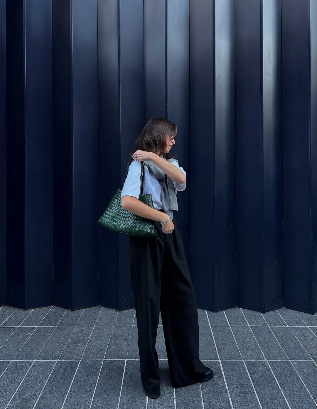 back to school outfits 2026 Minimal Tee, Wide Trousers, and a Sweater Over the Shoulders