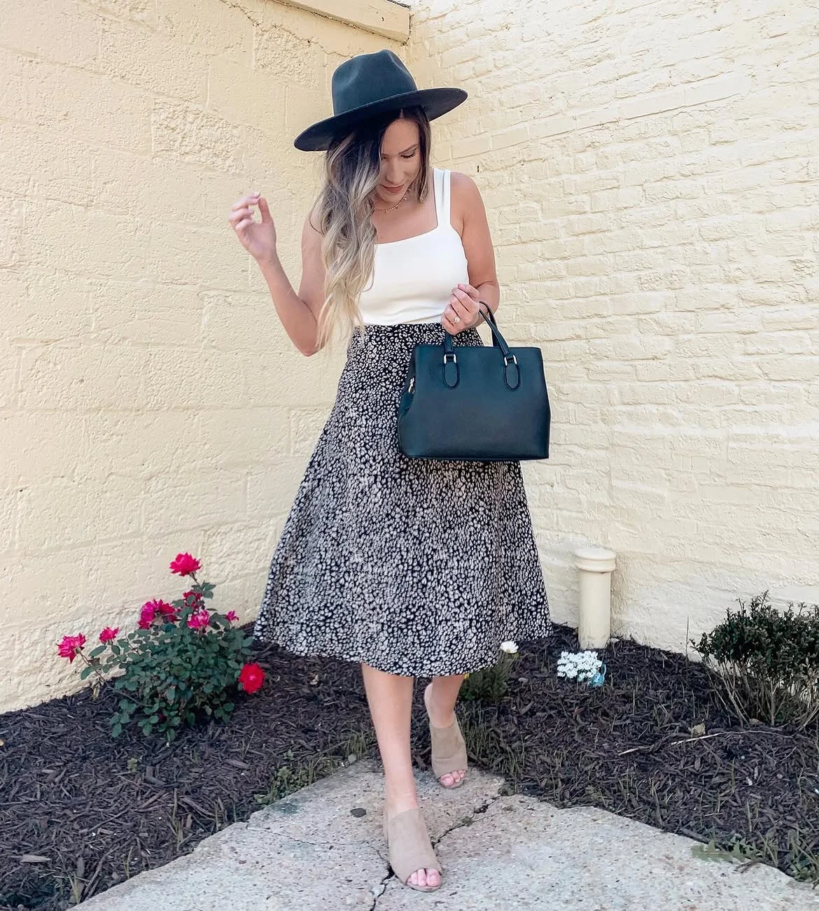 boho chic fall outfits 2026 + A Printed Midi Skirt With Polished Black Accessories