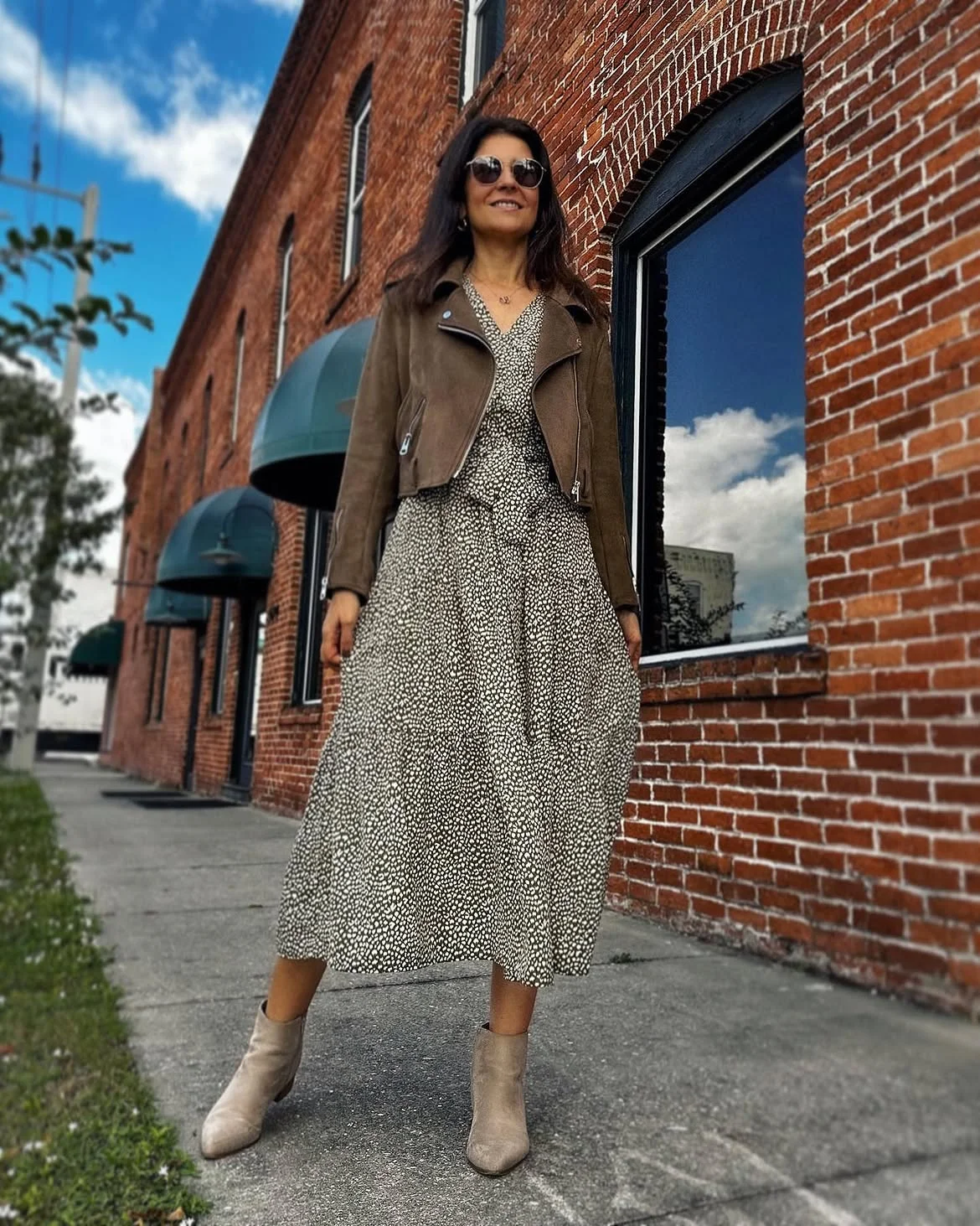 boho chic fall outfits 2026 + Soft Print Midi Dress With a Suede Moto Jacket