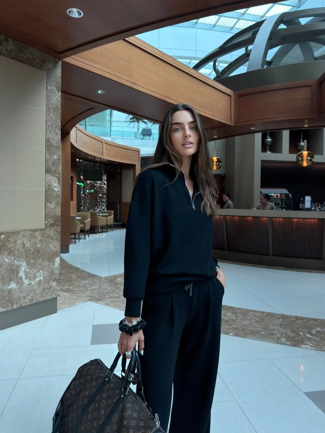 comfortable fall travel outfits 2026 Black Lounge Knit With Hotel Lobby Polish