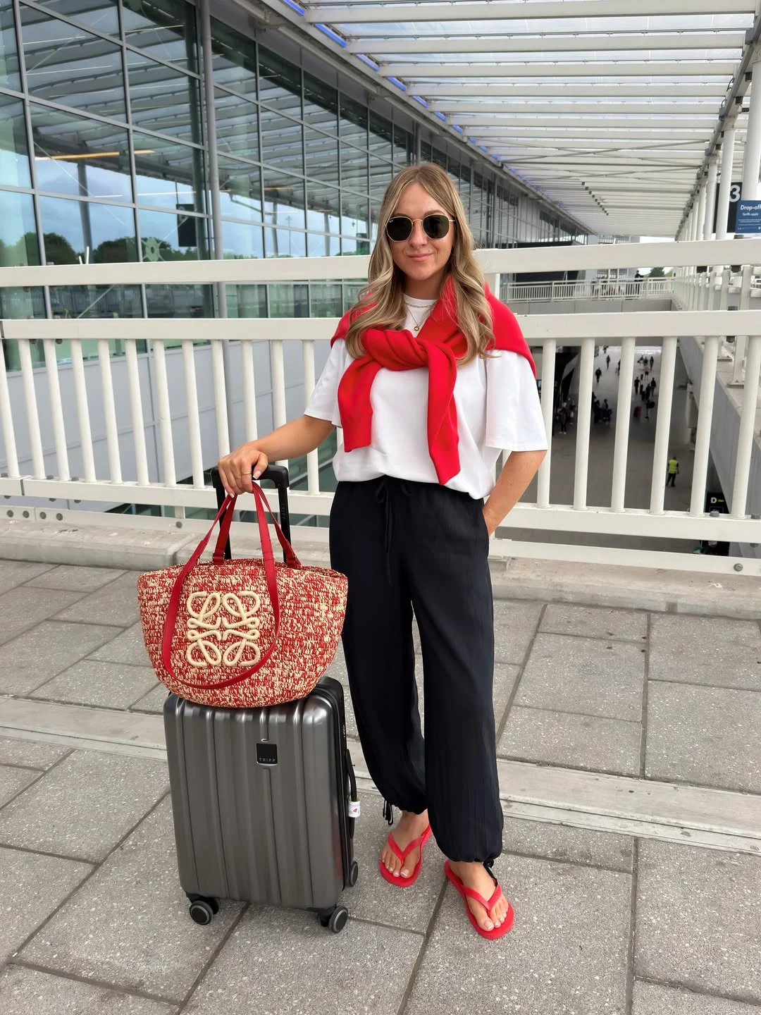 comfortable fall travel outfits 2026 Red Accents For A Cute Airport Coffee Stop