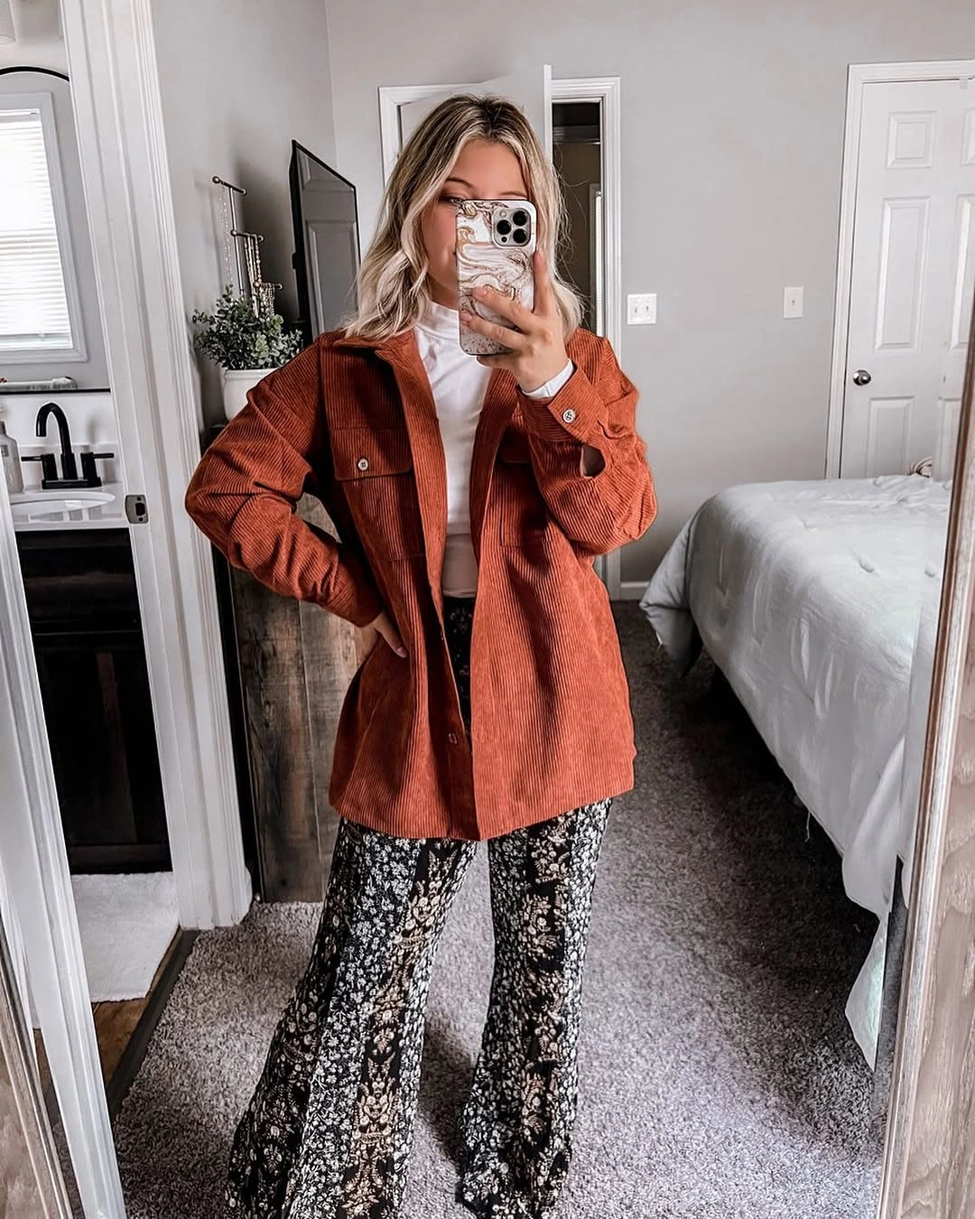 comfy fall outfits 2026 A Rust Corduroy Shacket and Printed Flares for a Retro Fall Mood