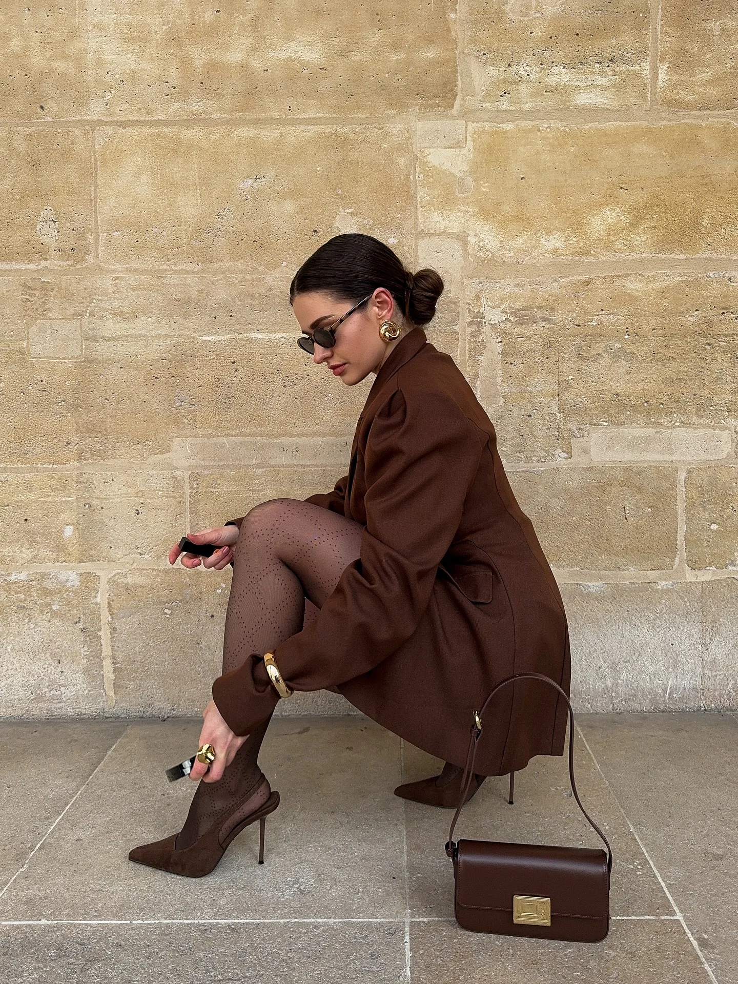 cozy & chic autumn outfits for women 2026 Monochrome Chocolate Tailoring with Sheer Tights and Sharp Heels