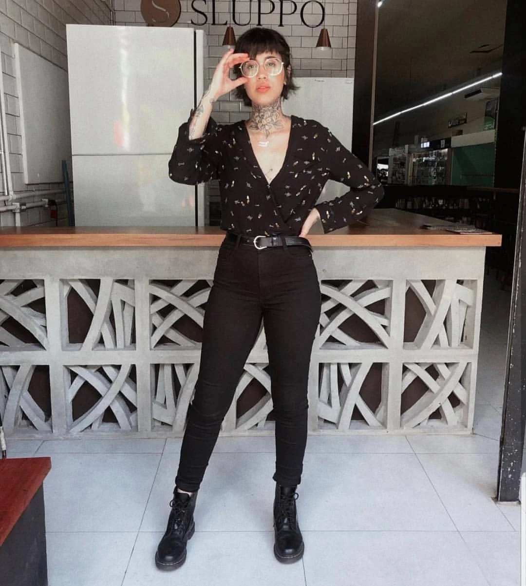 cute fall outfits docs 2026 All-Black Layers With a Printed Wrap Top
