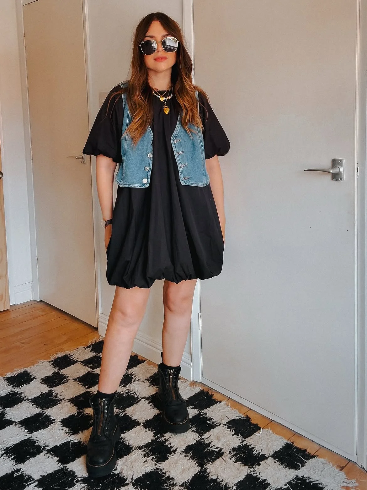 cute fall outfits docs 2026 The Denim Vest and Black Mini-Dress Formula