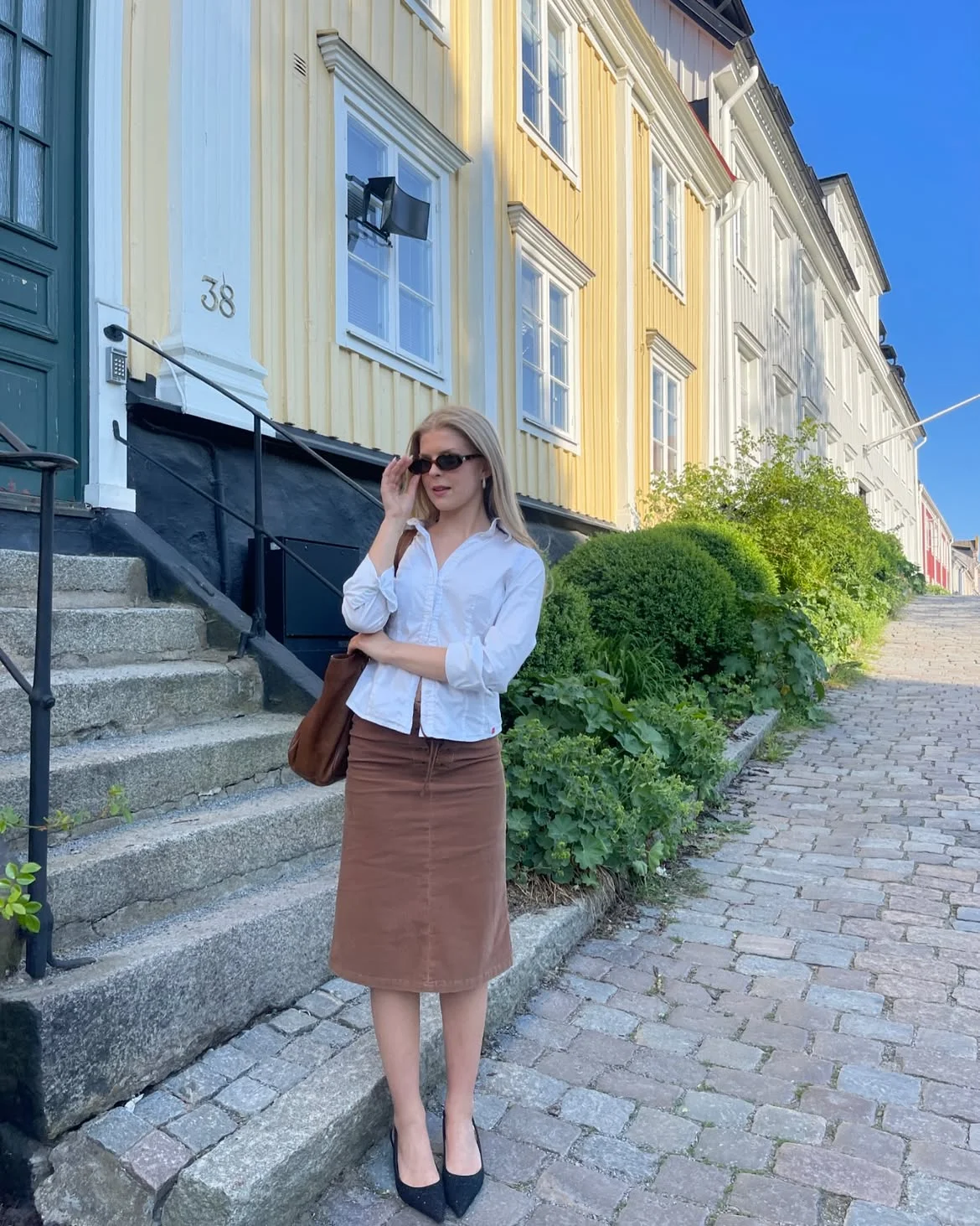 early fall outfits 2026 + A White Shirt and Brown Midi Skirt for a Soft Office Transition