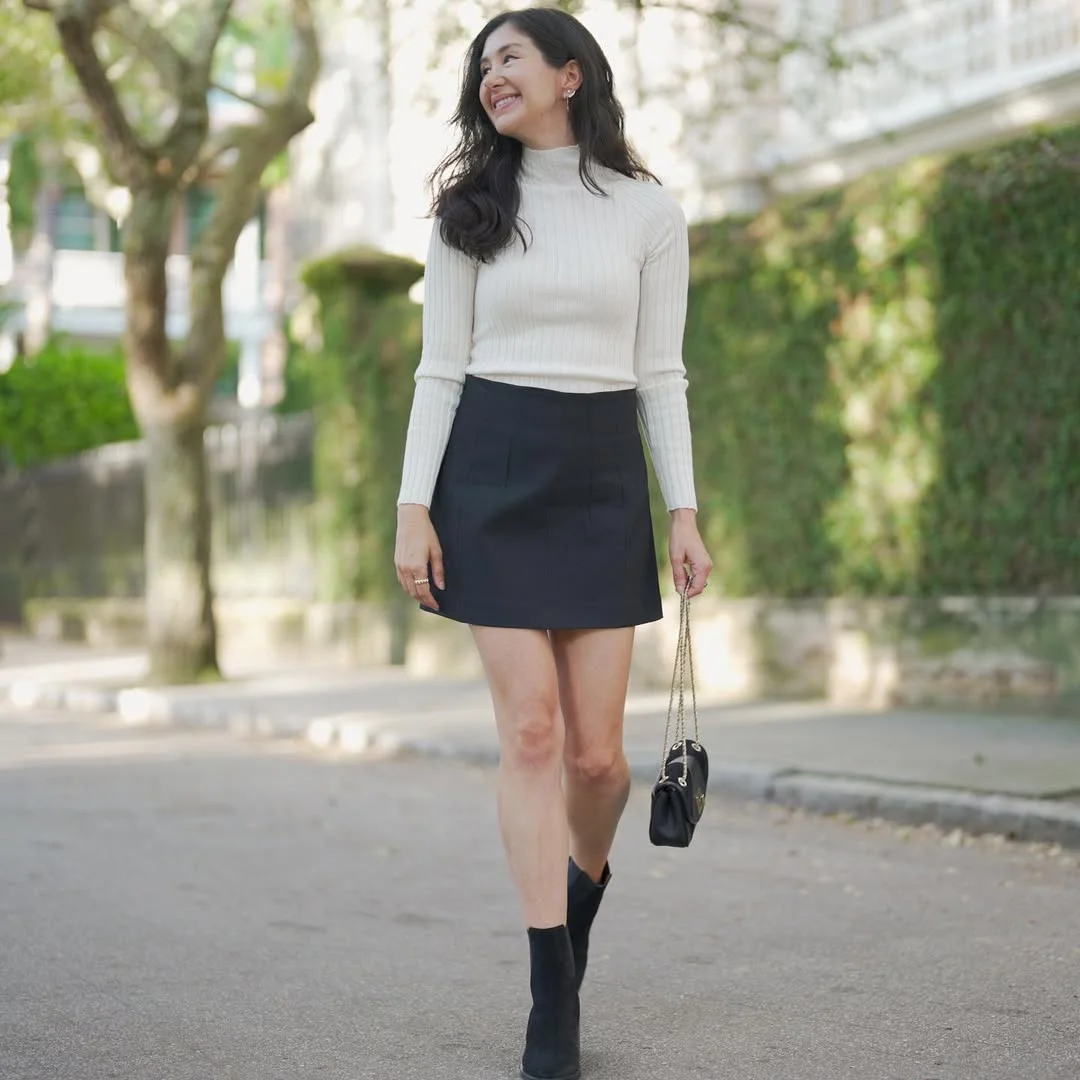 Early fall outfits ideas 2026 Ribbed Cream Top With A Black Mini Skirt