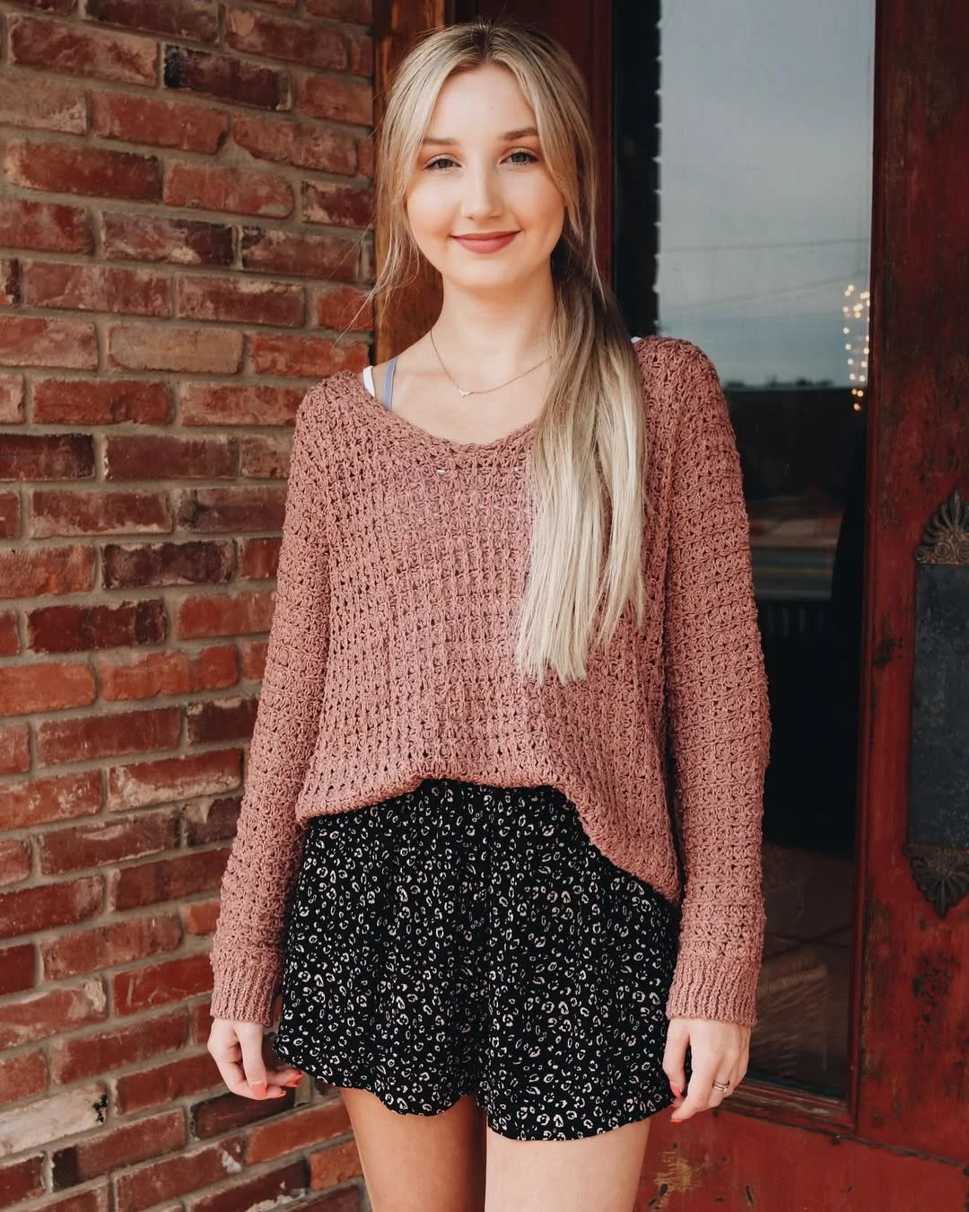 Early fall outfits ideas 2026 Mauve Open-Knit Sweater With Printed Shorts
