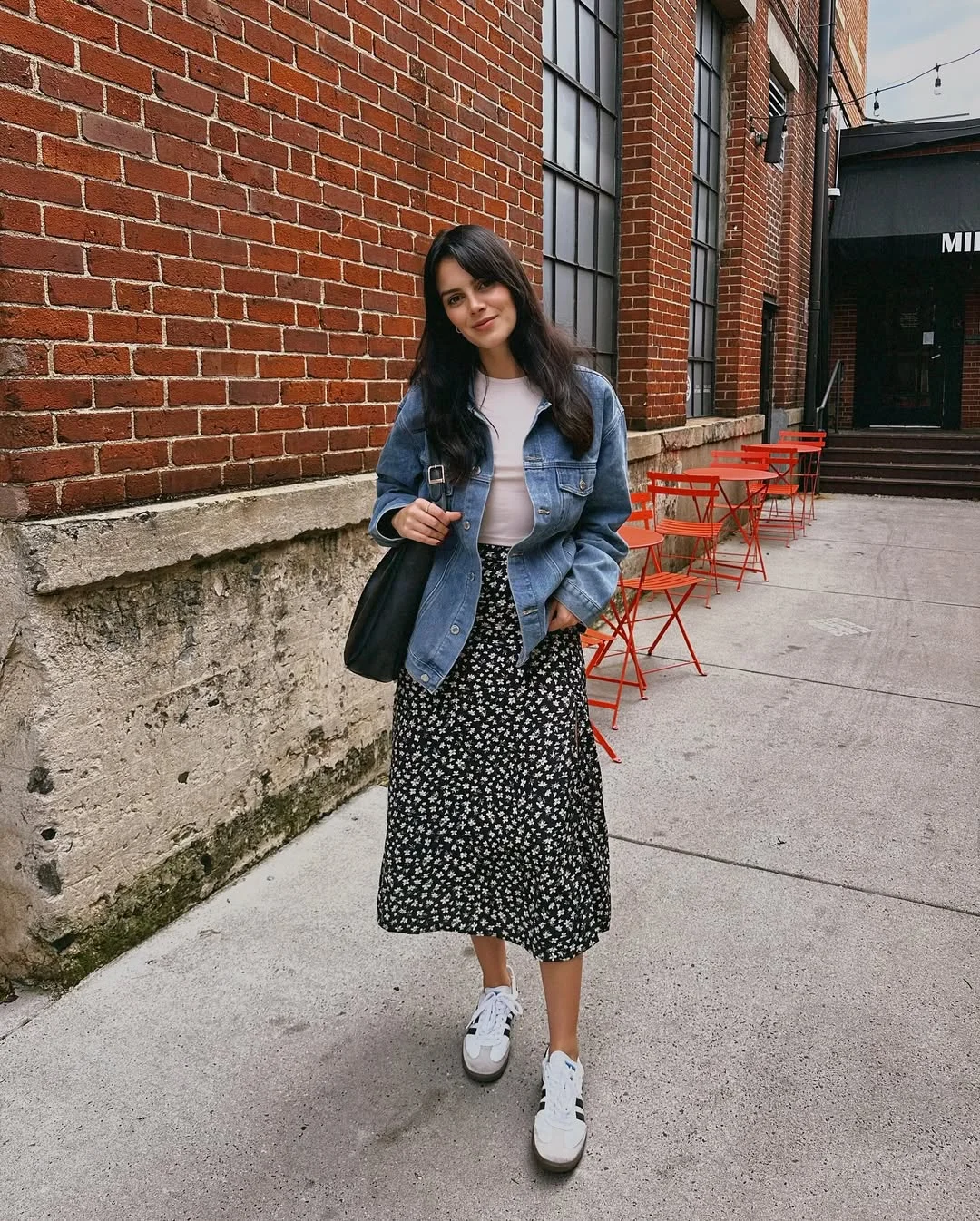 Early fall outfits ideas 2026 Denim Jacket With Floral Midi Skirt And Sneakers