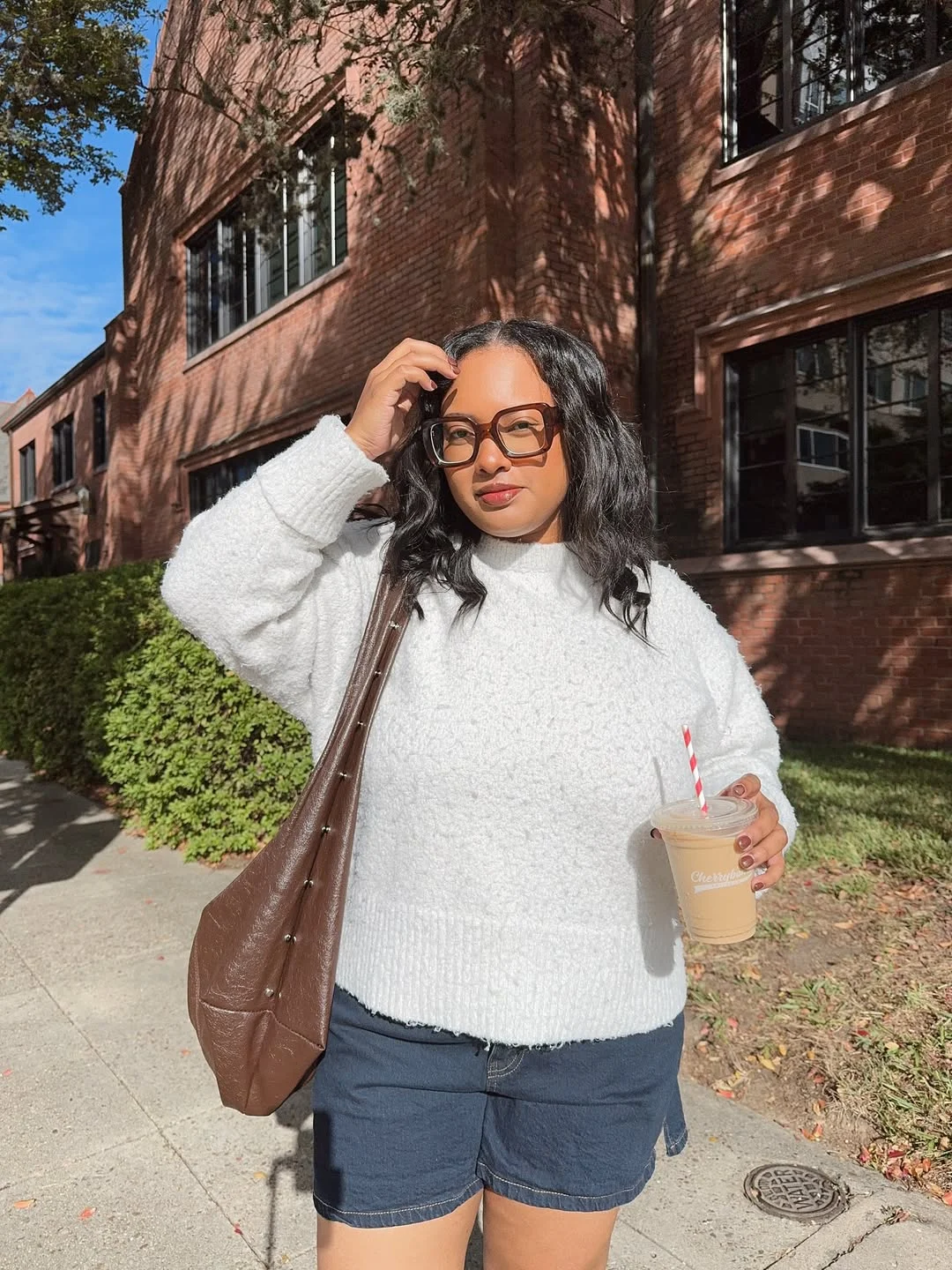 Early fall outfits ideas 2026 Cozy White Sweater With Denim Shorts