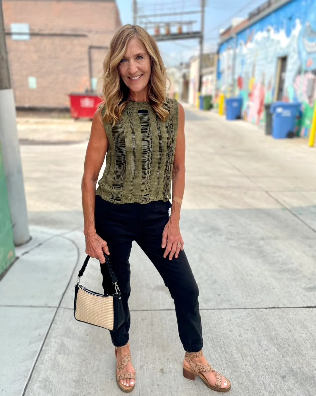 Early summer outfits 2026 Olive Open-Knit Top With Black Utility Pants