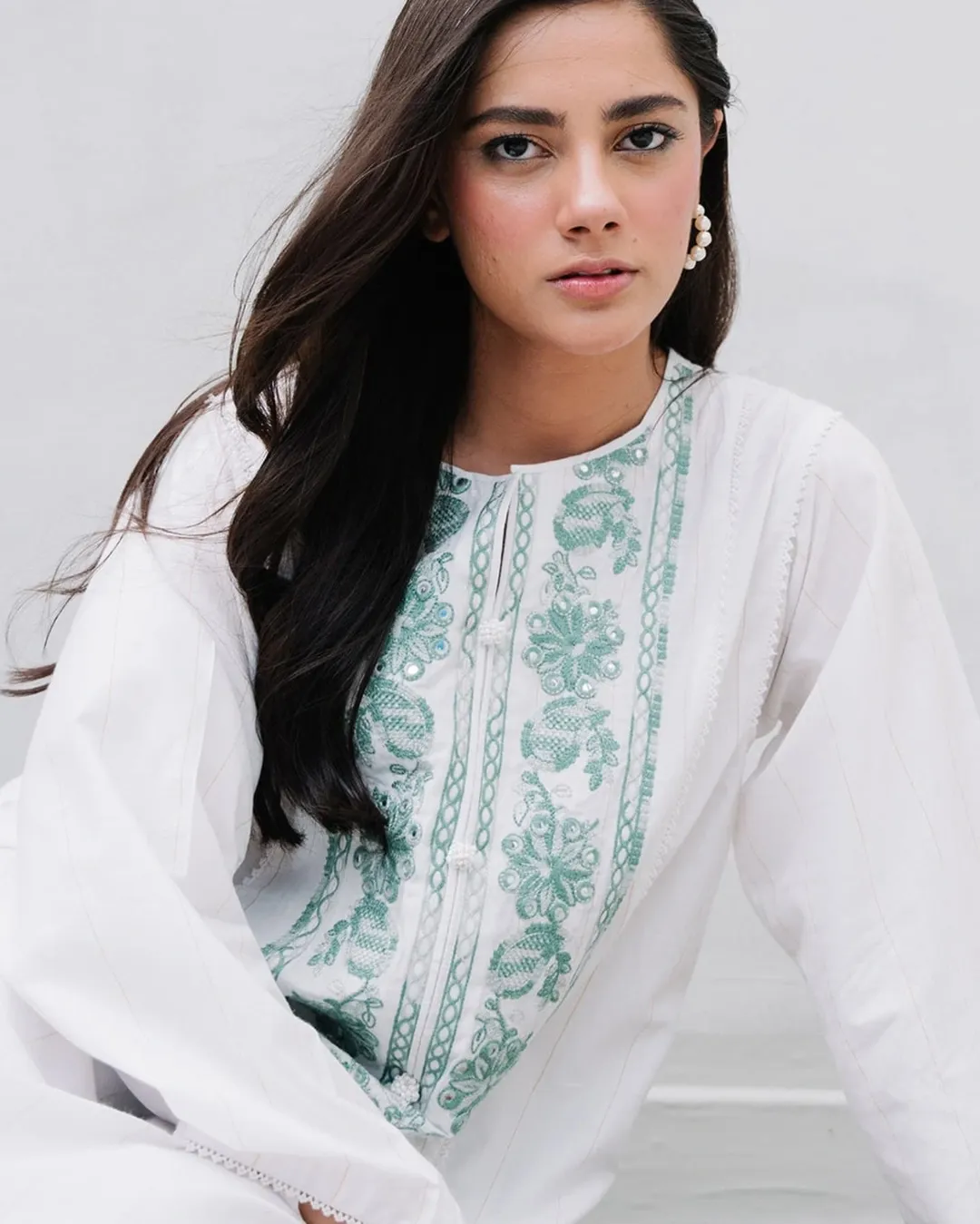 Early summer outfits 2026 Embroidered White Blouse With Aqua Detail