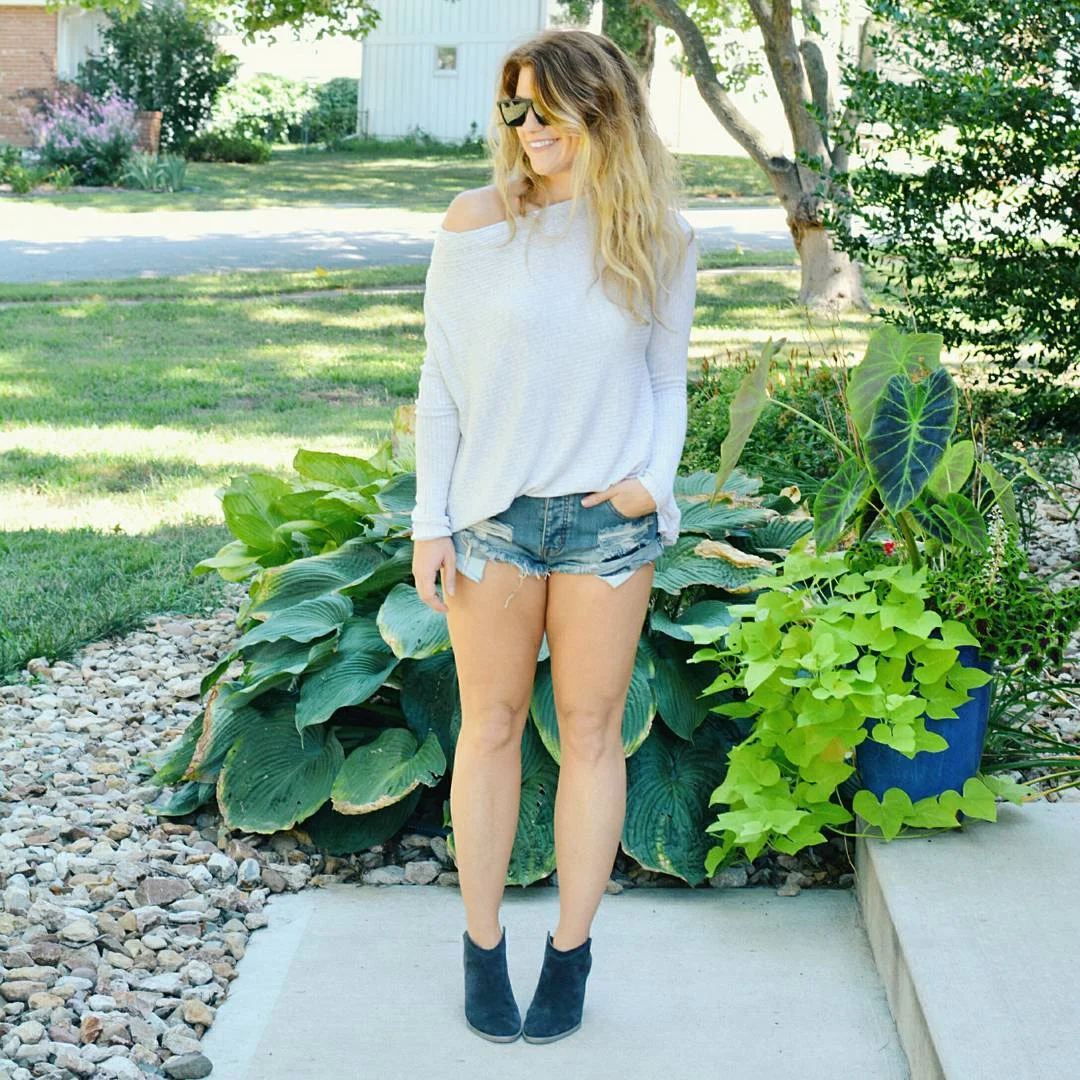 Early summer outfits 2026 Off-Shoulder Knit With Cutoff Denim