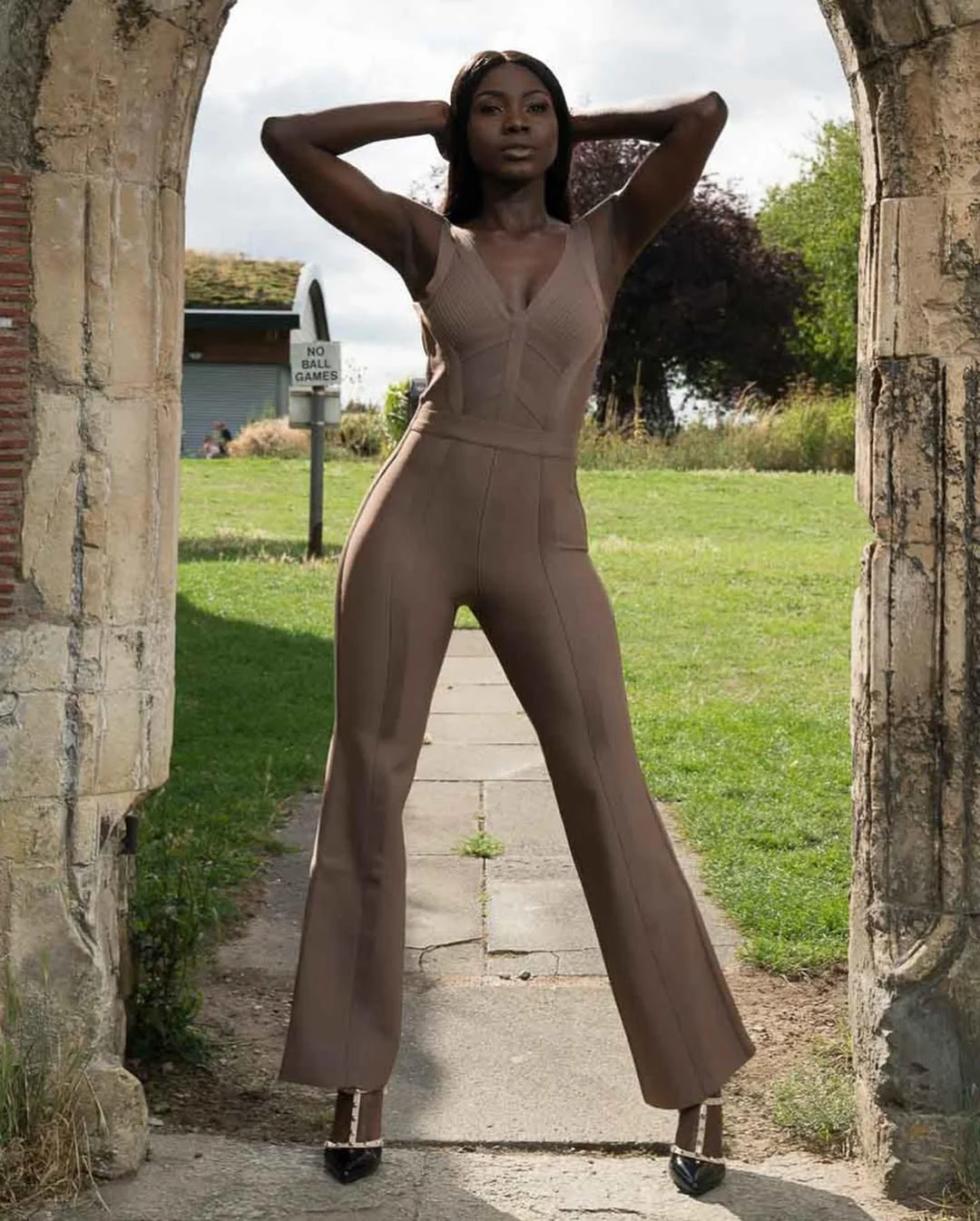 fall 2026 outfits for black women + Taupe Jumpsuit With Sculpted Fall Minimalism