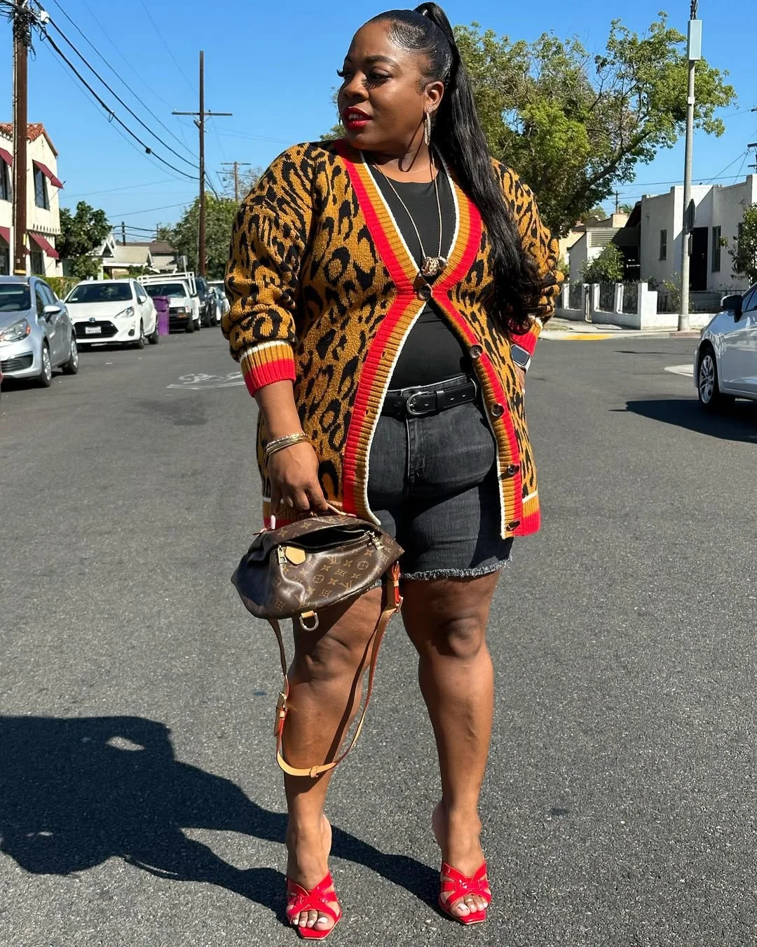 fall 2026 outfits for black women + Leopard Cardigan And Denim Shorts With Red Heel Energy