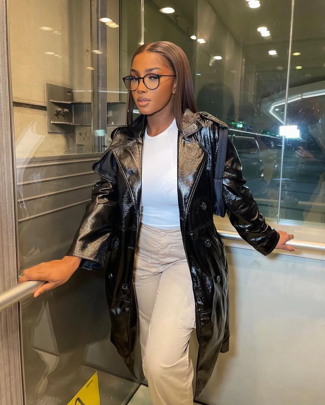 fall 2026 outfits for black women + Patent Leather Coat With Clean City Minimalism