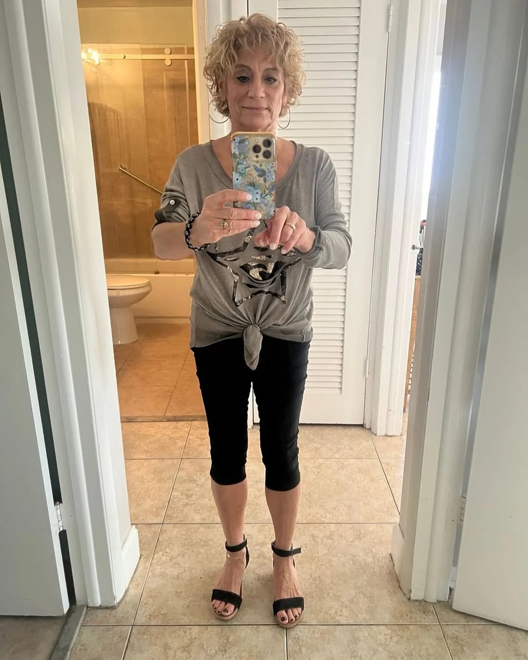 fall fashion for women over 40 A Graphic Tee and Slim Black Crops With Attitude