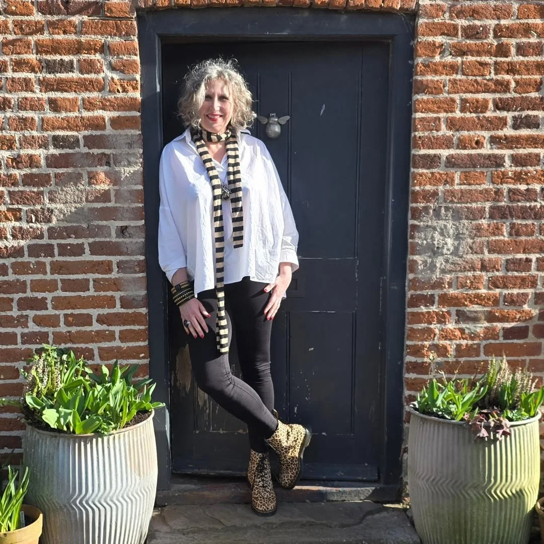 fall fashion for women over 40 Black and White With Leopard Boots for Instant Personality