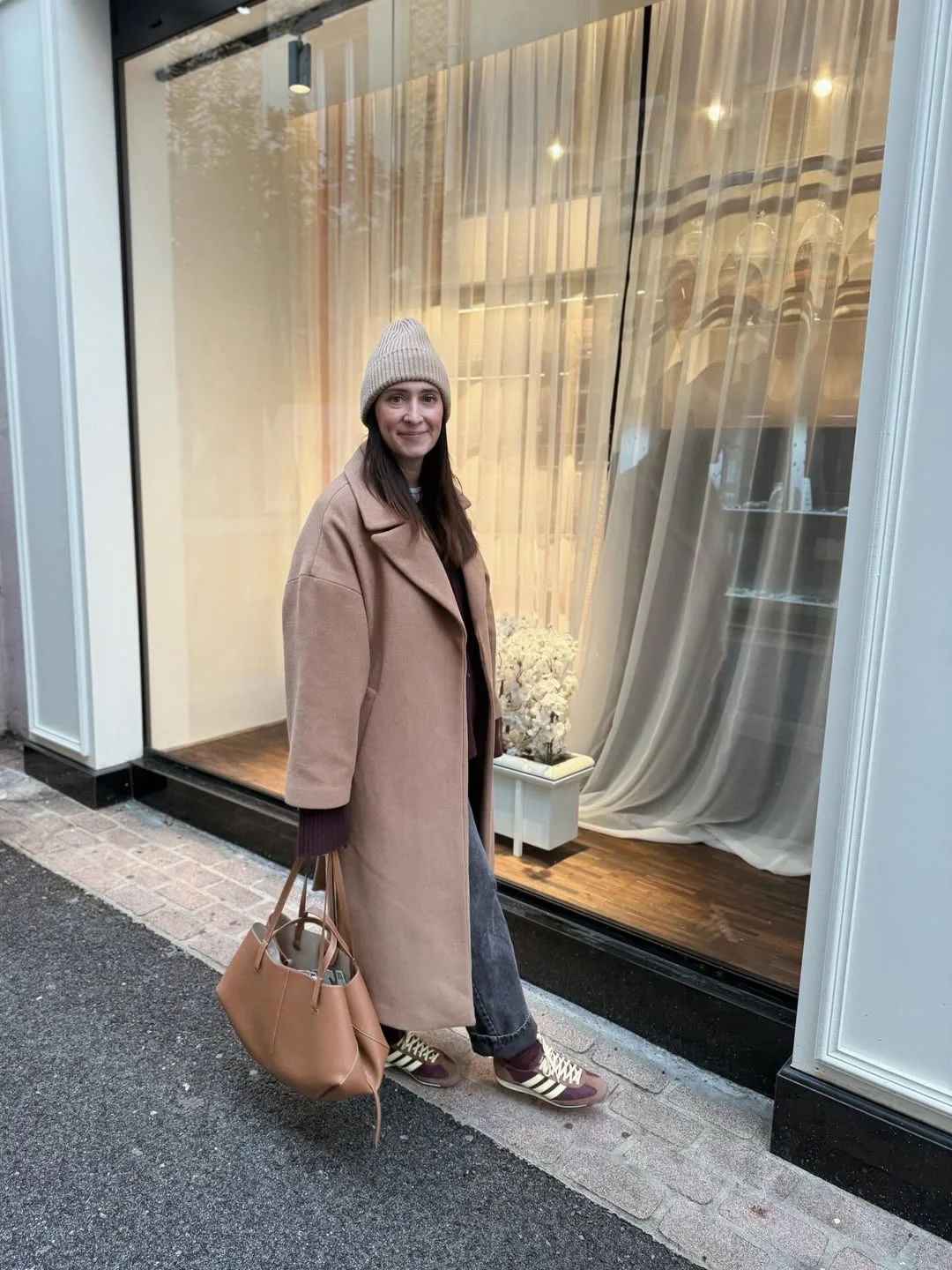 fall fashion for women over 40 Camel Coat, Burgundy Layers, and Retro Sneakers