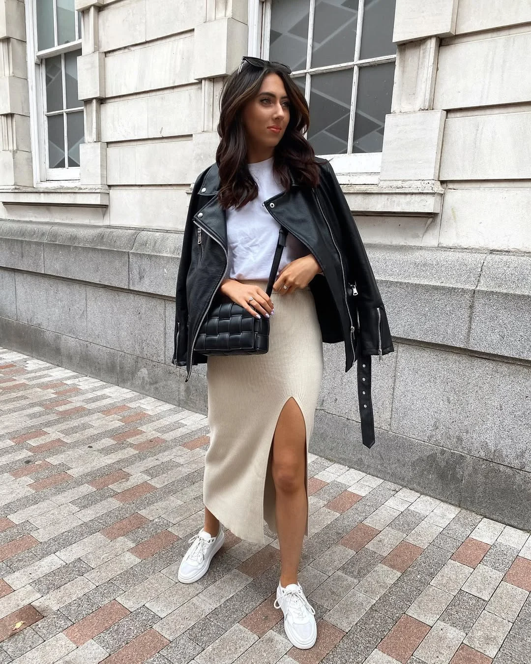 fall fashion outfits 2026 Leather Biker Jacket With a Cream Knit Midi Skirt