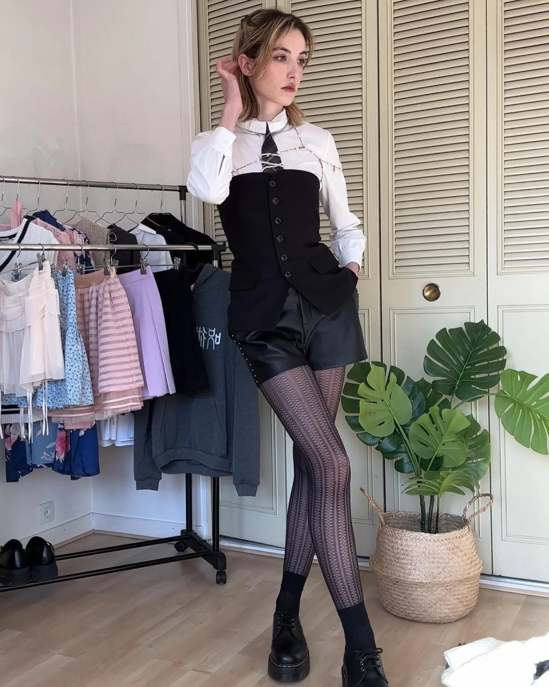 fall fashion outfits 2026 Black Waistcoat Leather Shorts and Patterned Tights