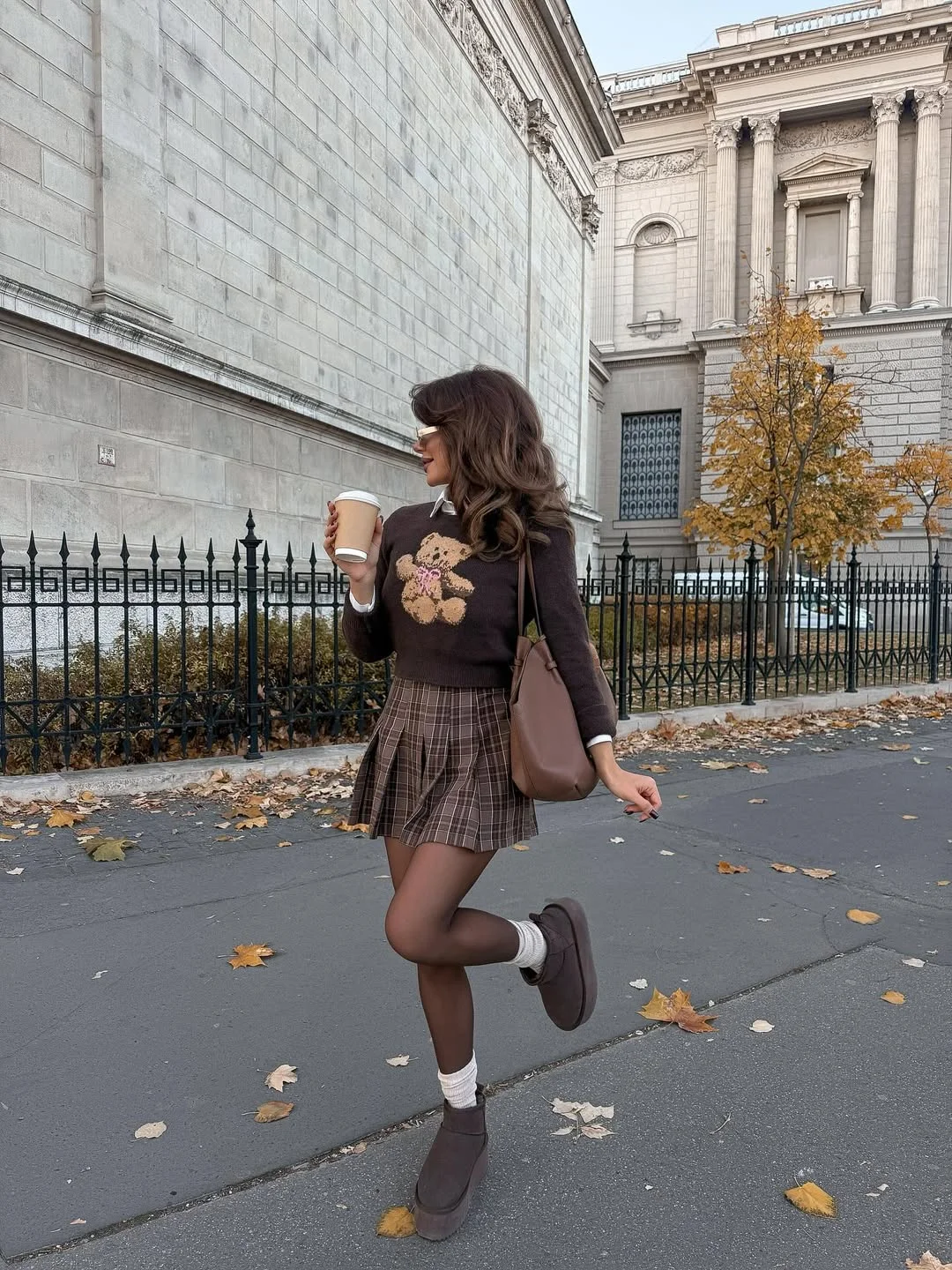 fall fashion outfits 2026 Chocolate Bear Sweater With a Plaid Pleated Skirt