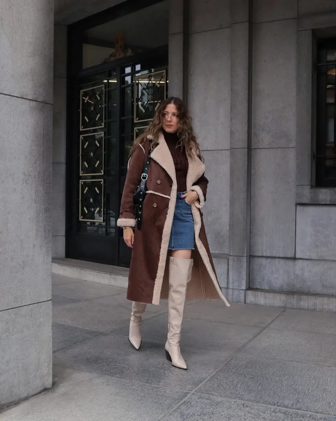 fall fashion outfits 2026 Shearling-Lined Coat With a Denim Mini and Cream Boots