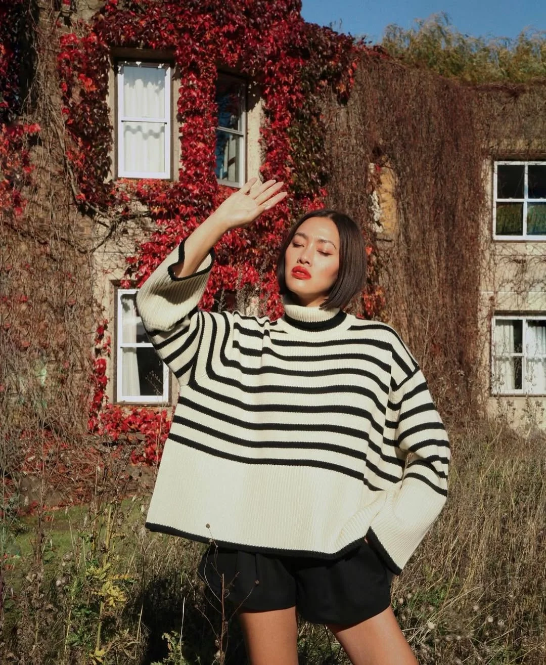 fall fashion outfits 2026 Oversized Striped Sweater With Black Tailored Shorts