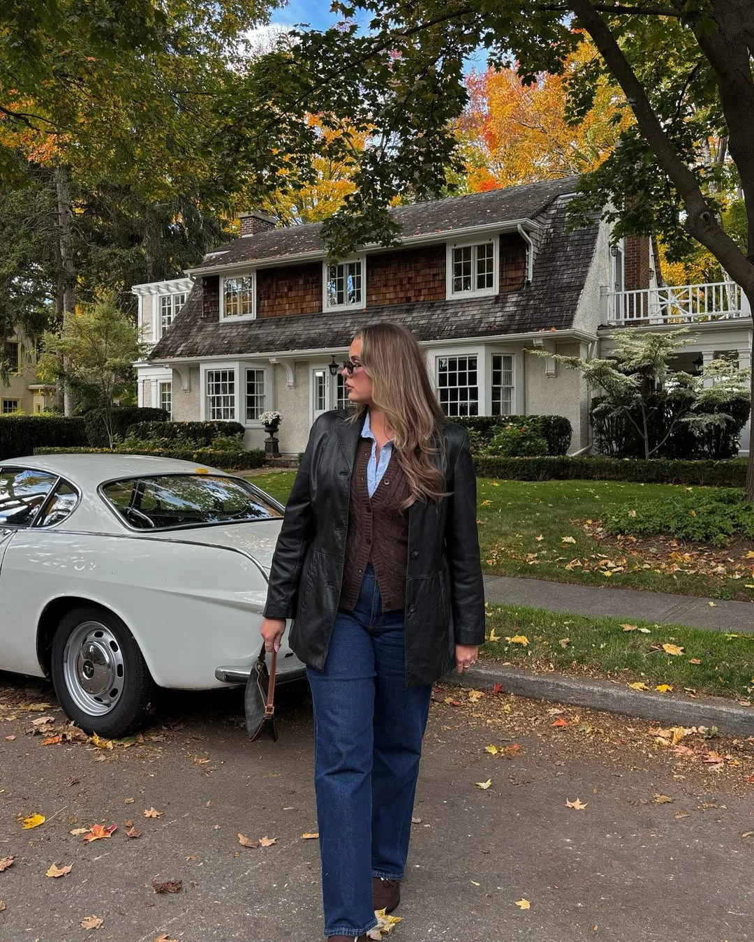 nyc fall outfits street style casual 2026 + Leather Blazer, Brown Cardigan, And Dark Denim