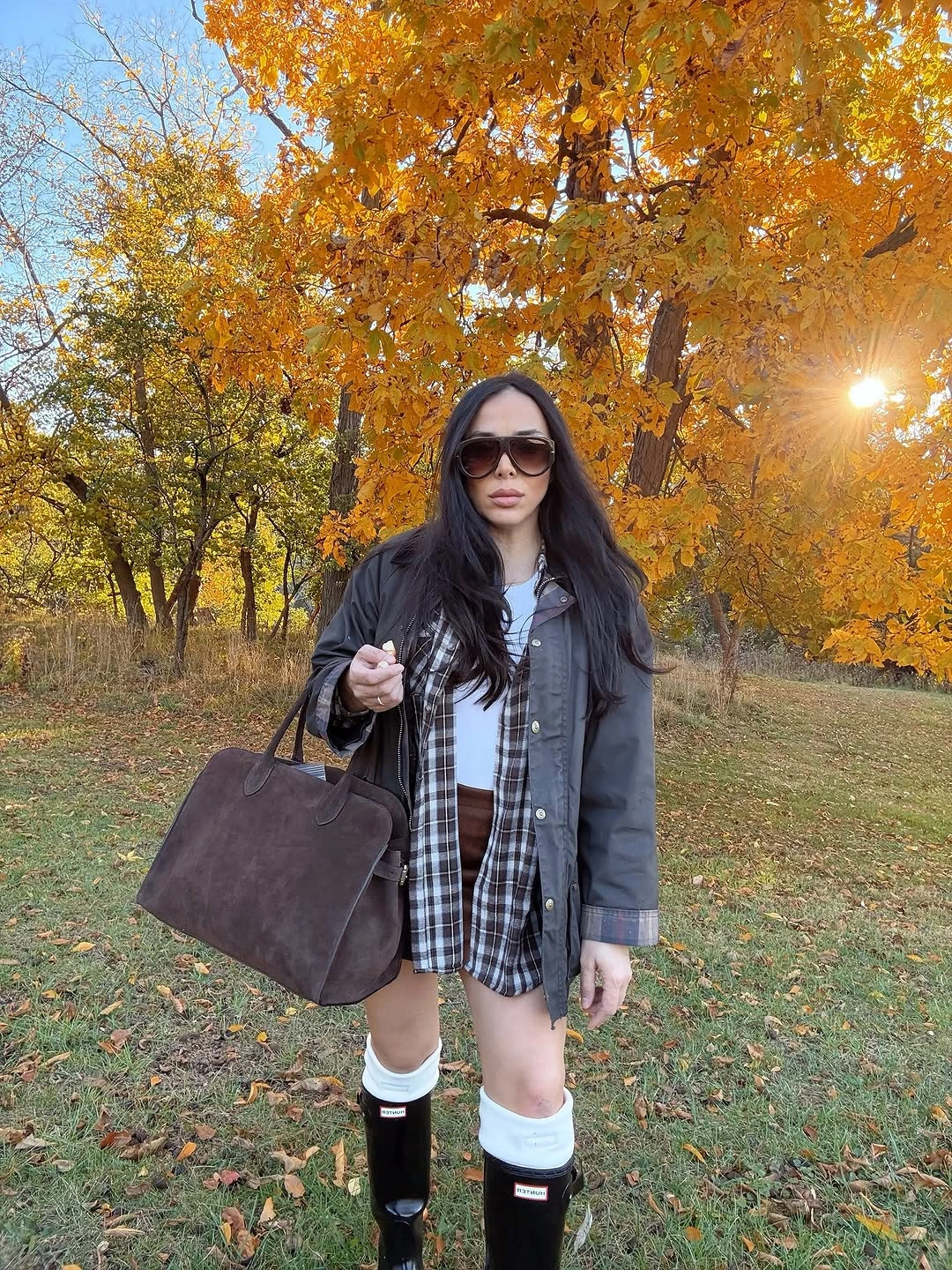 fall mom outfits 2026 Rain Boots, a Plaid Layer, and Shorts for Golden Fall Days