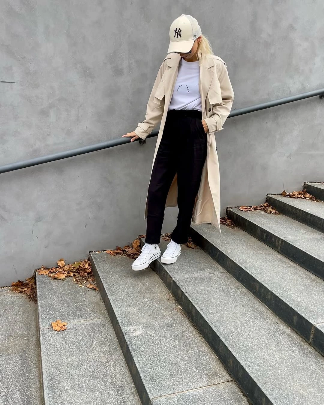 fall mom outfits 2026 A Trench Coat and Baseball Cap for Minimalist Fall Style
