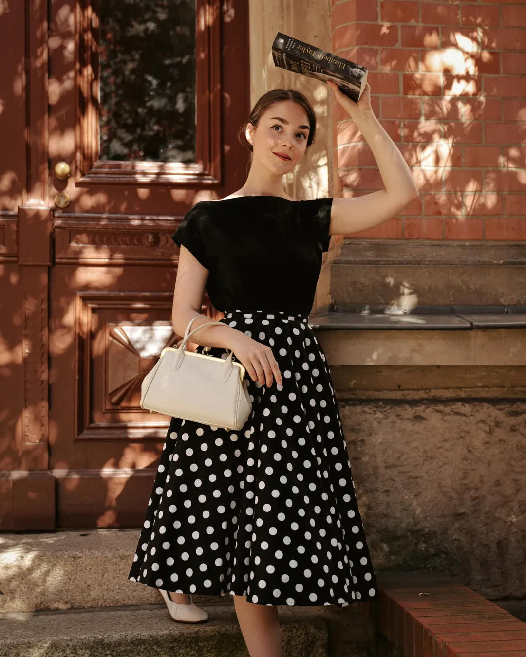 fall outfits for women in 30s style 2026 - Polka Dots and a Black Top for an Easy Vintage-Feminine Fall Look