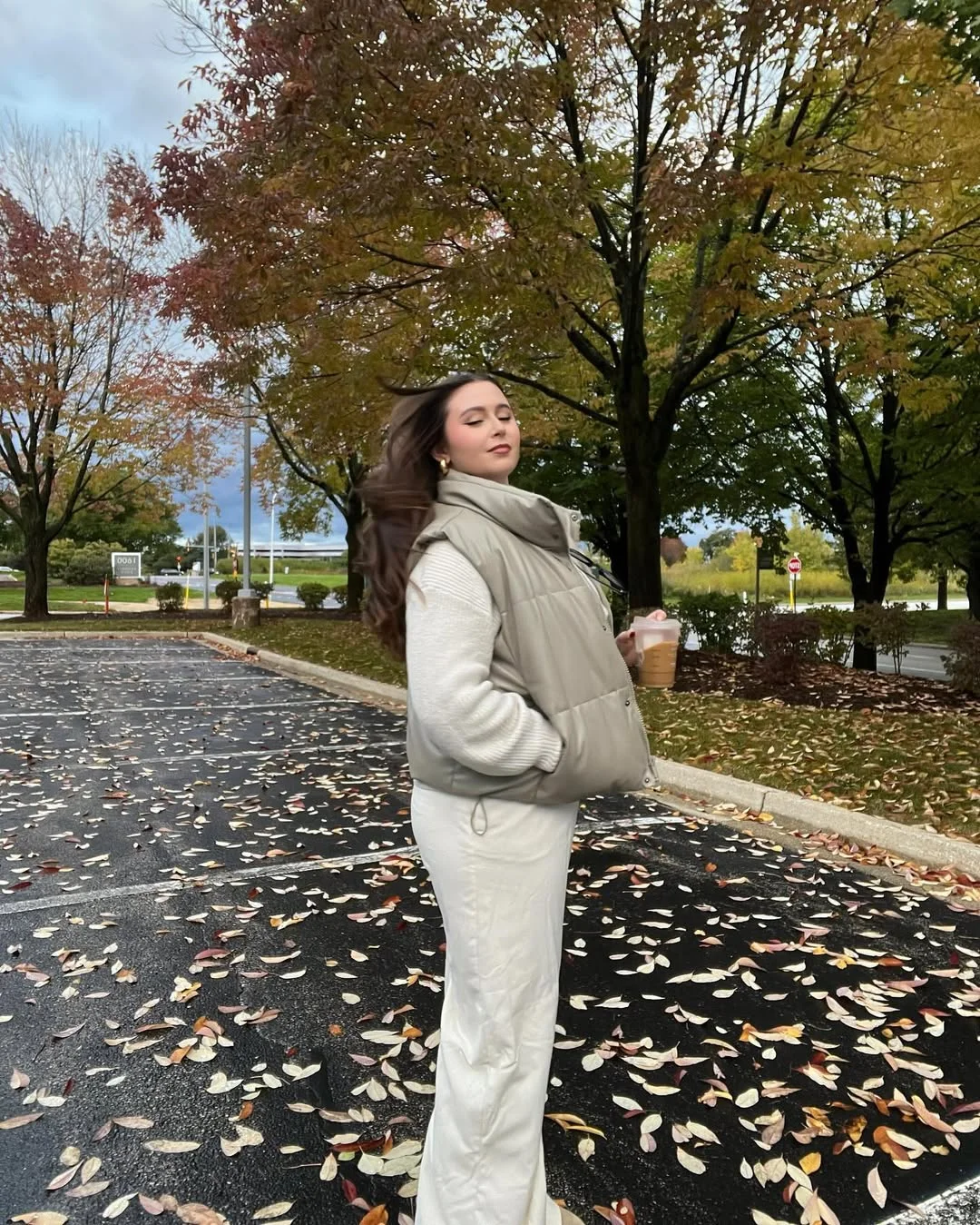 Early summer outfits 2026 Soft Cream Knit Set With A Taupe Puffer Vest