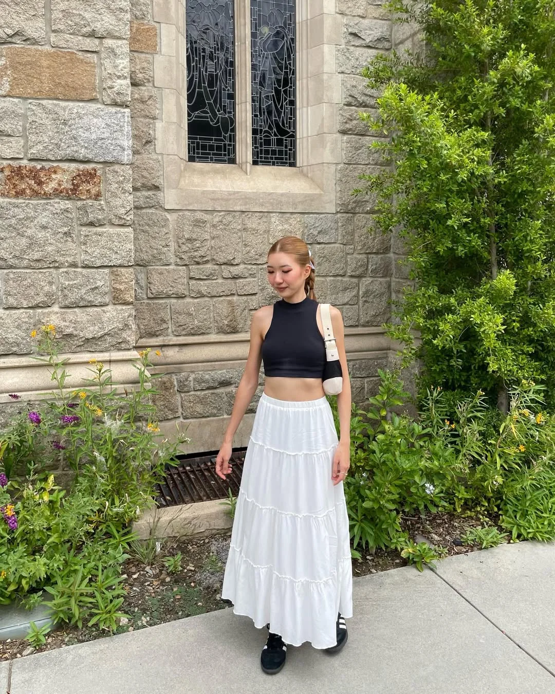 Early summer outfits 2026 Black Crop Top And White Tiered Skirt Contrast
