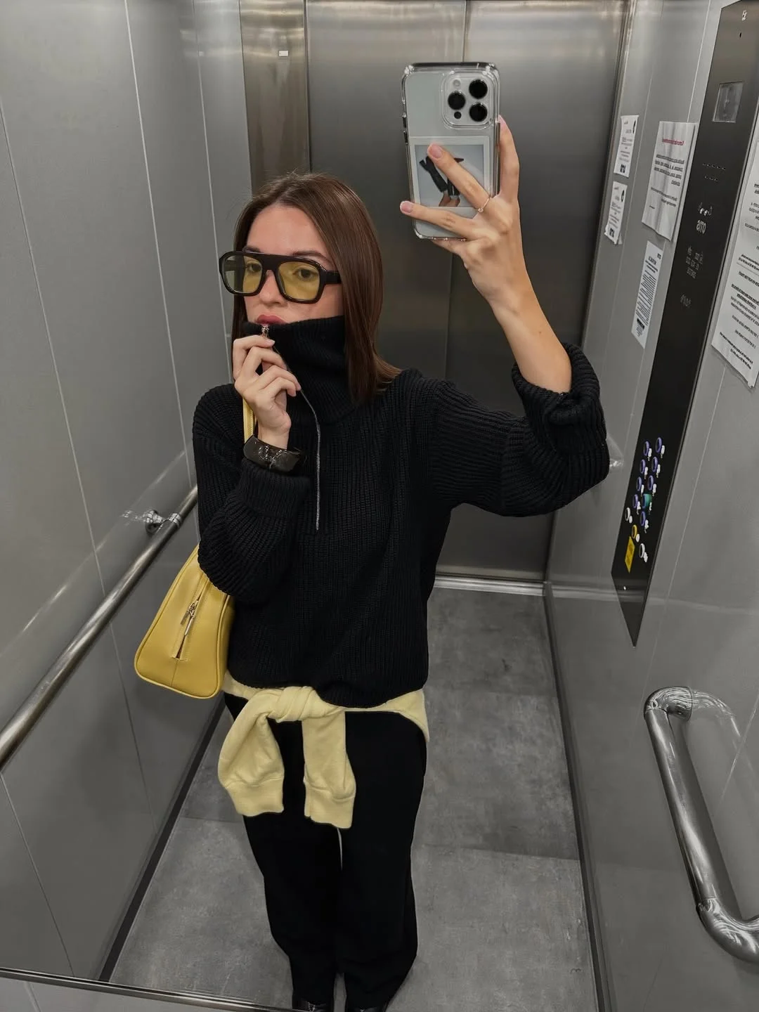 Early summer outfits 2026 Black Knit Layers With A Butter-Yellow Accent