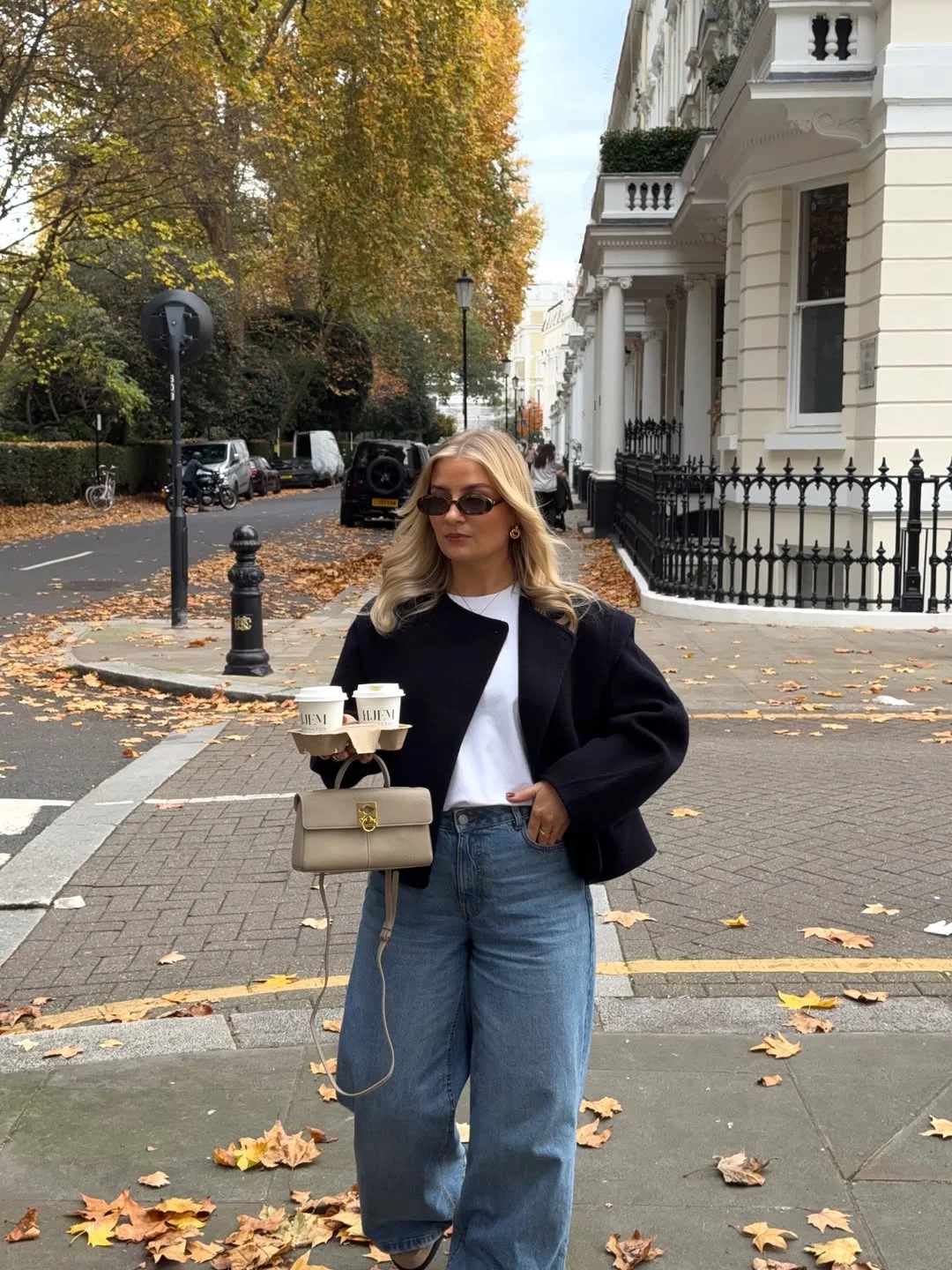 fall outfits with jeans 2026 + Cropped Black Jacket And Relaxed Jeans For Coffee Runs