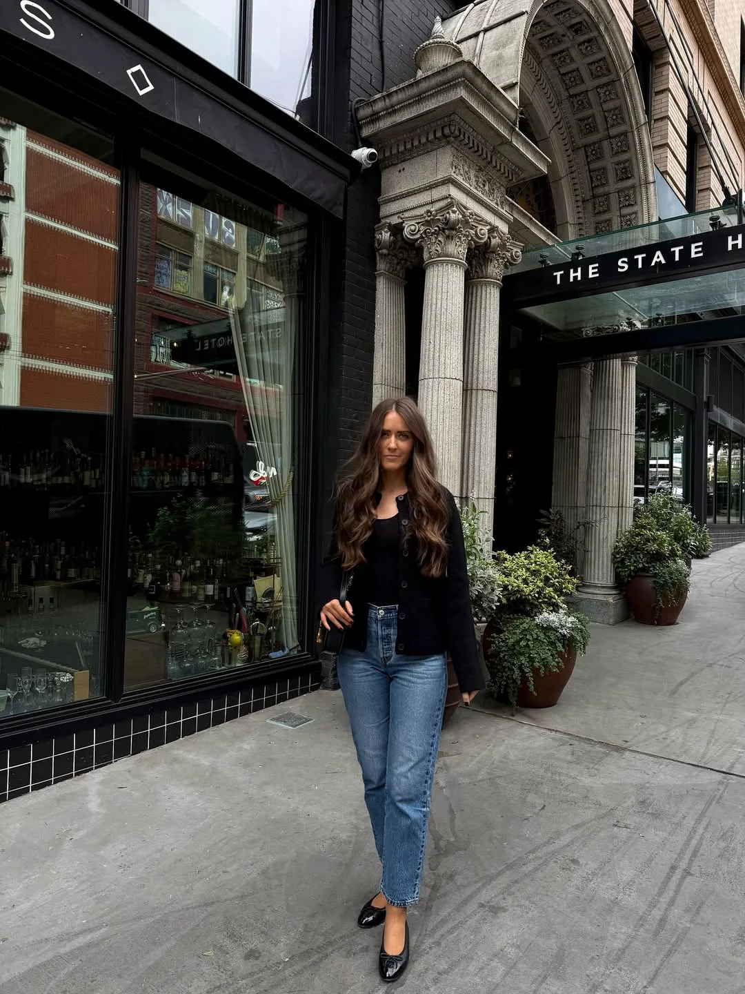 fall outfits with jeans 2026 + Black Cardigan, Straight Jeans, And Glossy Flats
