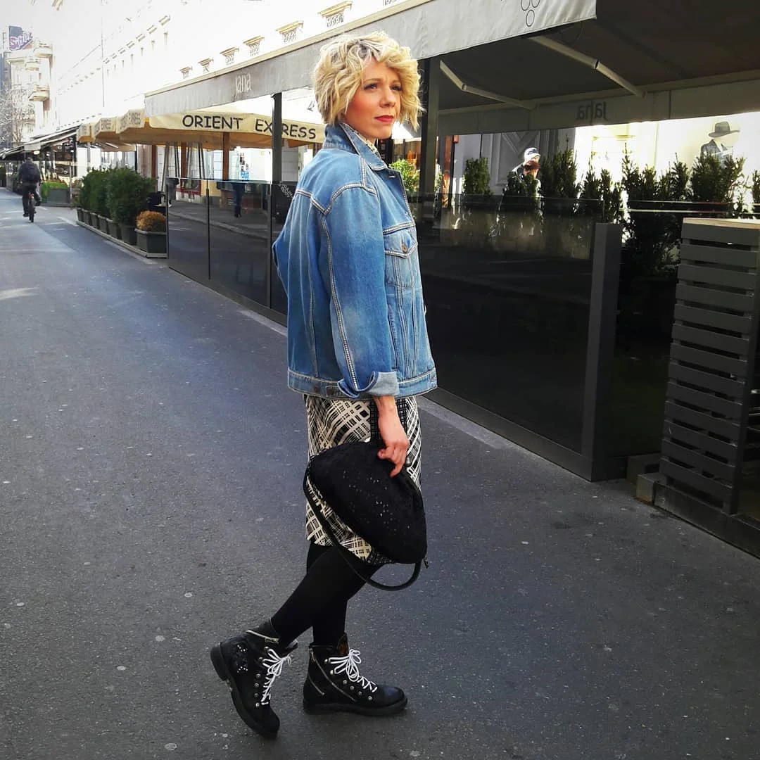 fall outfits with jeans jacket 2026 Oversized Denim Jacket With Patterned Layers And Combat Boots