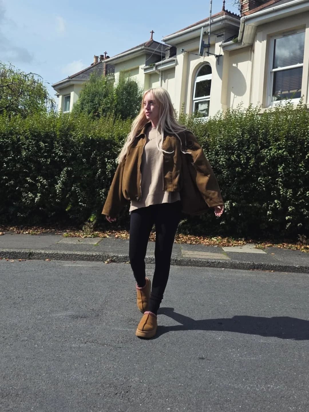 fall outfits with leggings and boots 2026 + Brown Shearling Jacket and Chestnut Ankle Boots