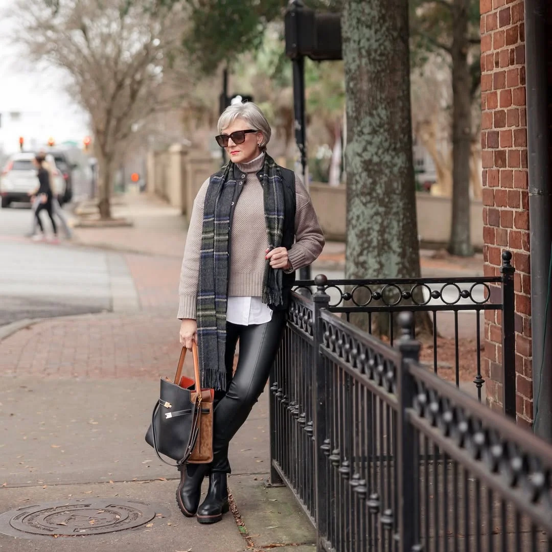 fall outfits with leggings and boots 2026 + Layered Knitwear With Leather Leggings and Lug Boots