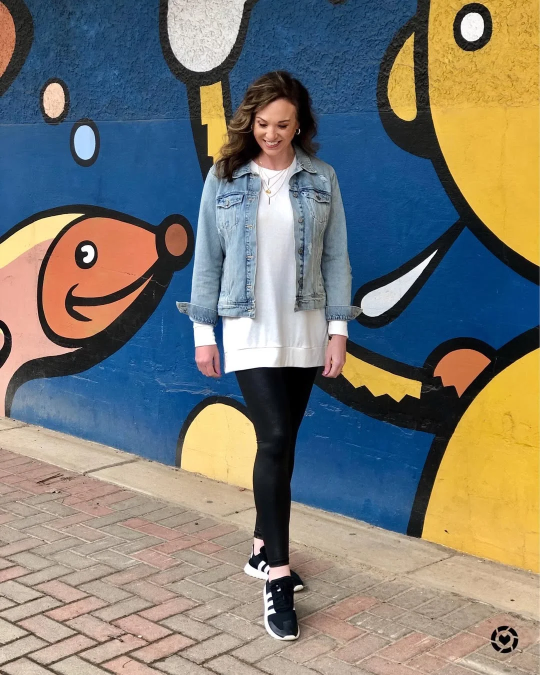 fall outfits with leggings and sneakers 2026 Denim Jacket With A White Sweatshirt And Glossy Black Leggings