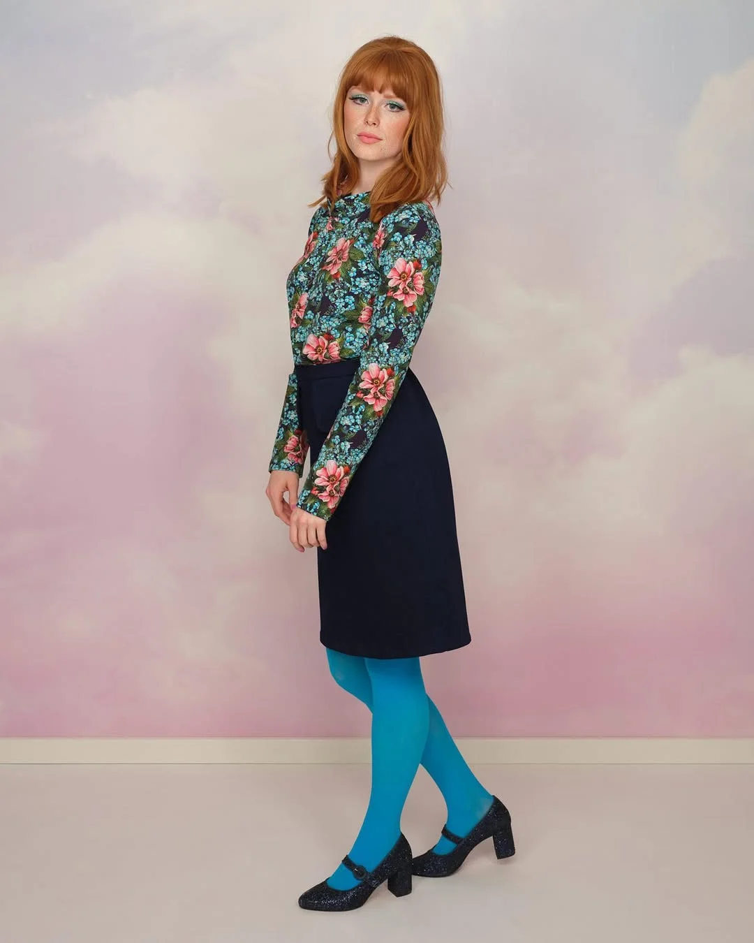 fall outfits with tights and skirt 2026 + Teal Tights with a Floral Top and Navy Skirt