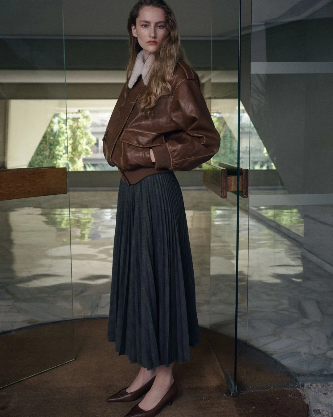 fall outfits with tights and skirt 2026 + Brown Leather Bomber with a Pleated Midi Skirt