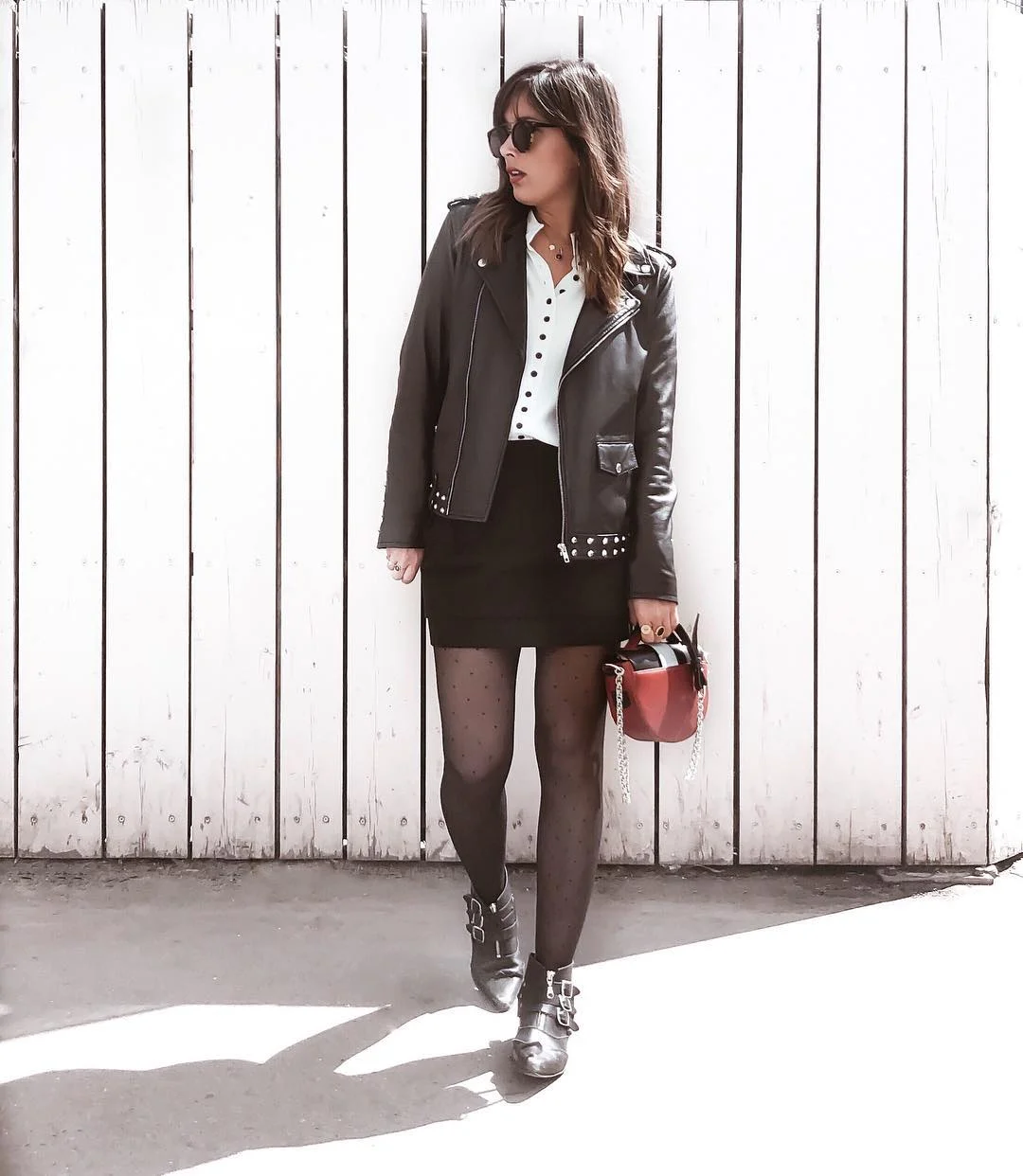 fall outfits with tights and skirt 2026 + Polka-Dot Tights, Leather Jacket, and a Black Mini