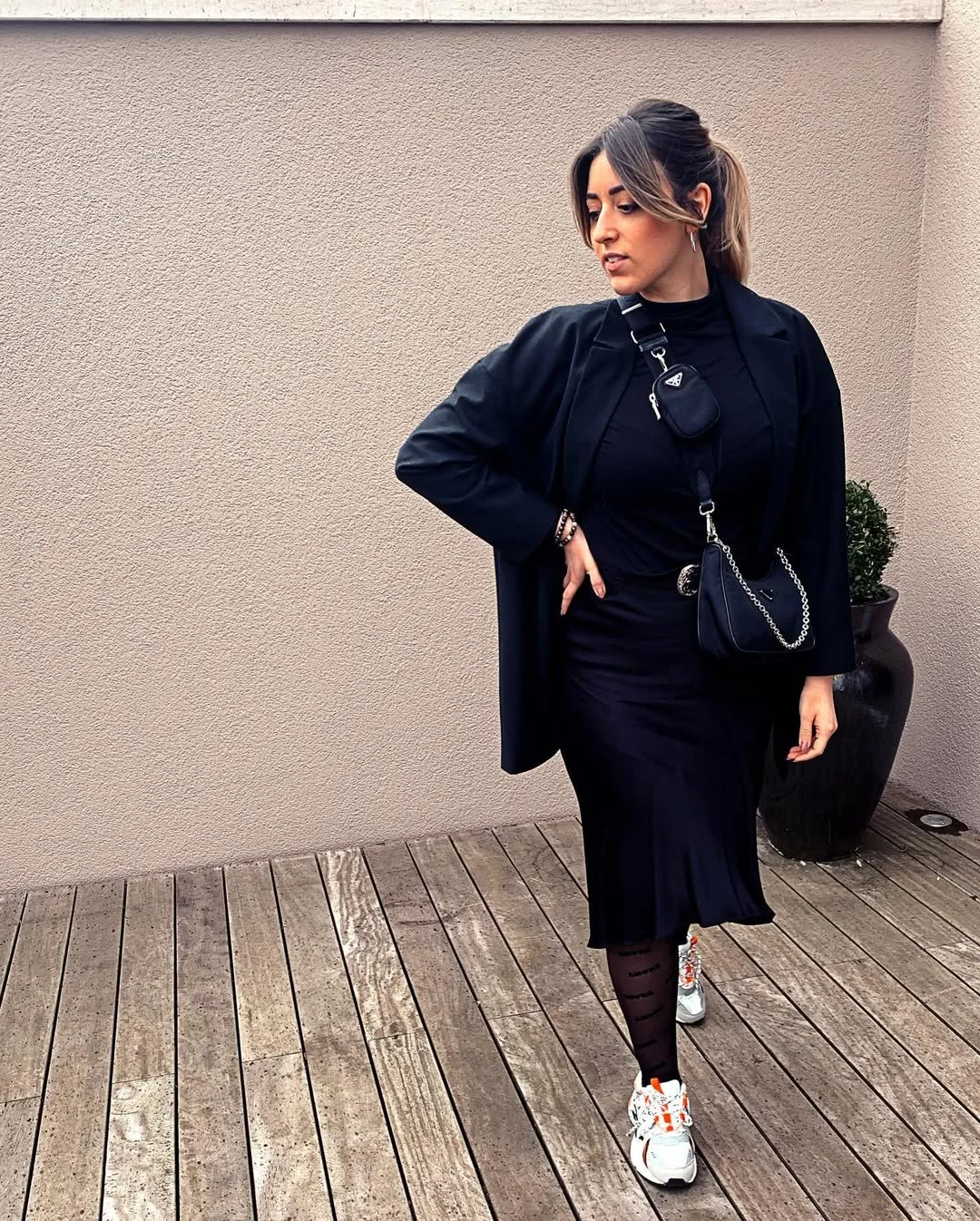 fall outfits with tights and sneakers 2026 + All-Black Midi Dress With Statement Tights And Sneakers