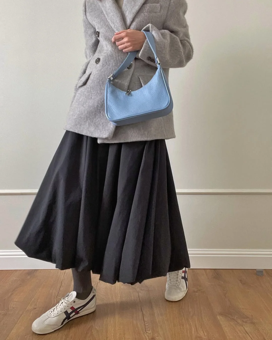 fall outfits with tights and sneakers 2026 + Soft Gray Tailoring With A Full Black Skirt