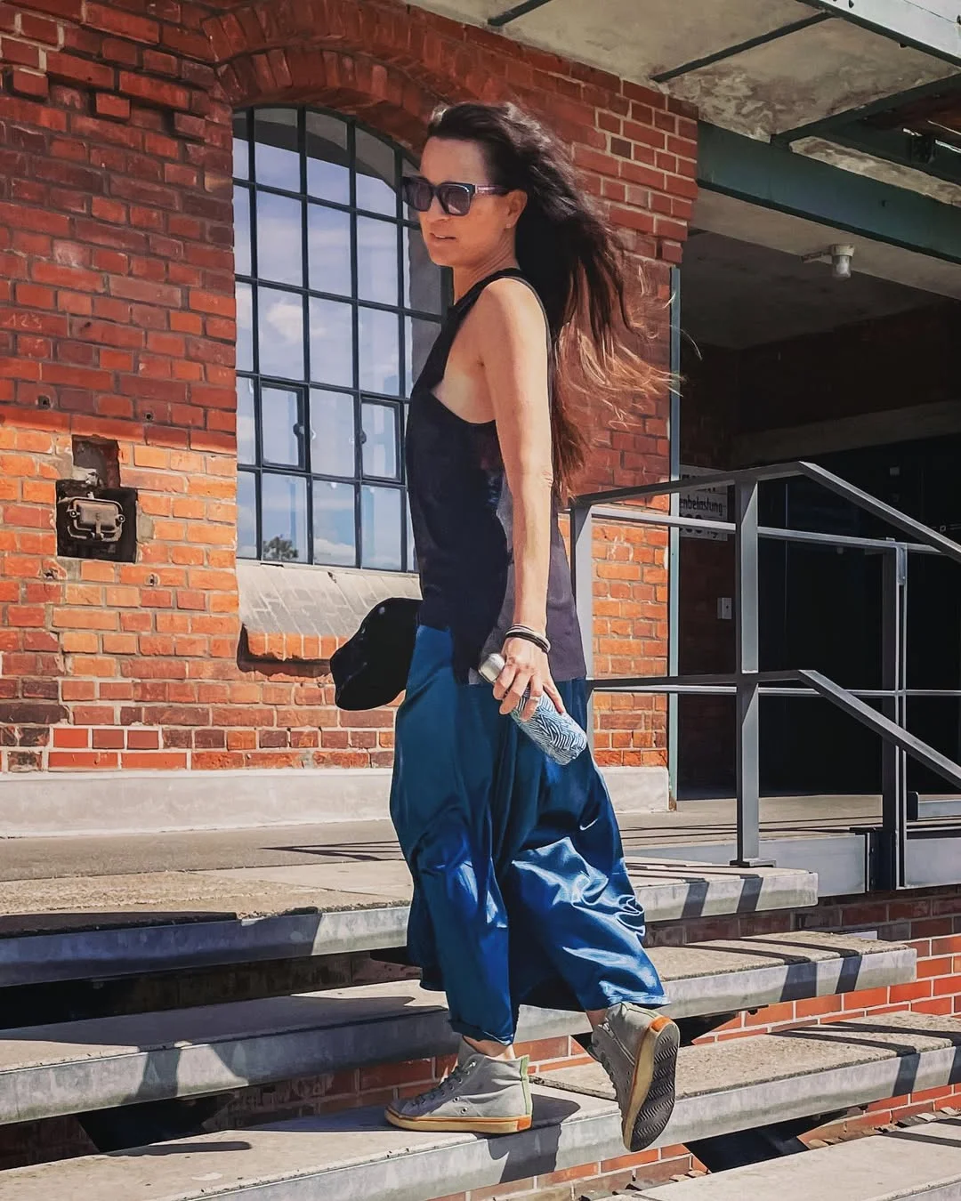 fall skirt and sneakers outfits 2026 + Blue Satin Skirt With A Black Tank And Gray High-Top Sneakers