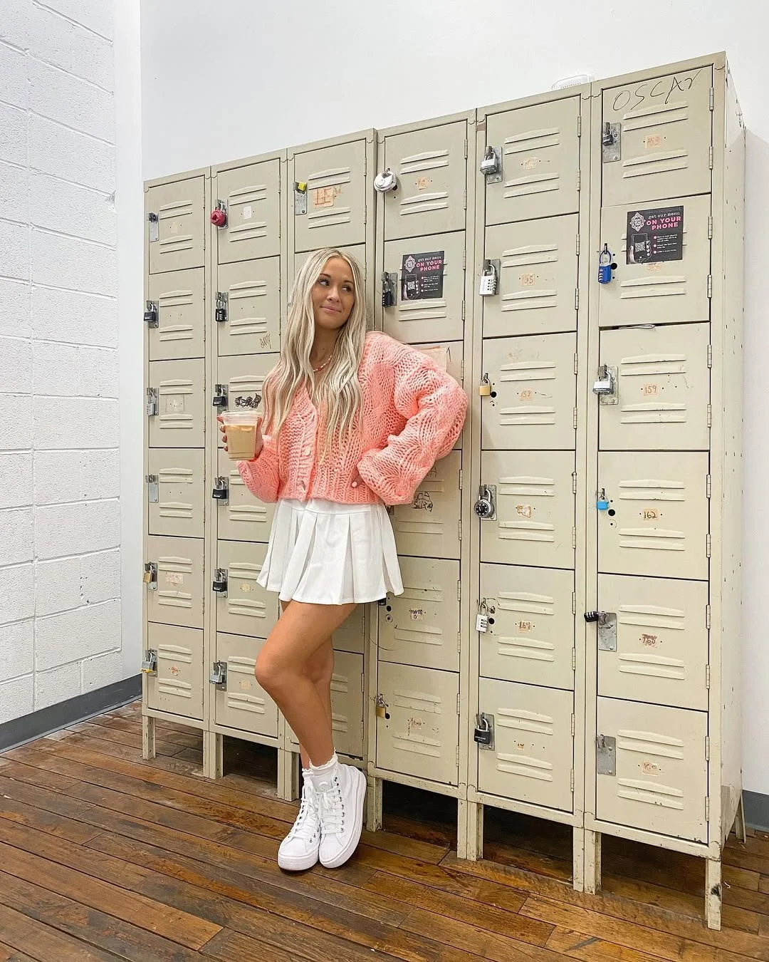 fall skirt and sneakers outfits 2026 + White Pleated Mini Skirt With A Pink Cardigan And High-Top Sneakers